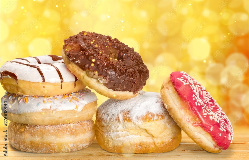 Delicious glazed doughnuts isolated on white background Delicious glazed doughnuts isolated on white background