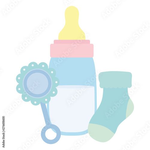 baby bottle milk with maraca and sock
