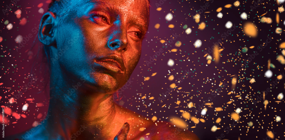Golden Makeup - Fashion Portrait With Gold Skin And Glittering In Shiny Background Golden Makeup - Fashion Portrait With Gold Skin And Glittering In Shiny Background
