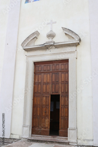 A  large wooden open church door
