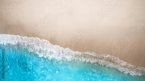 Turquoise wave at the beach