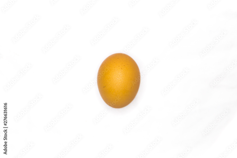 Single brown chicken egg isolated on white Single brown chicken egg isolated on white