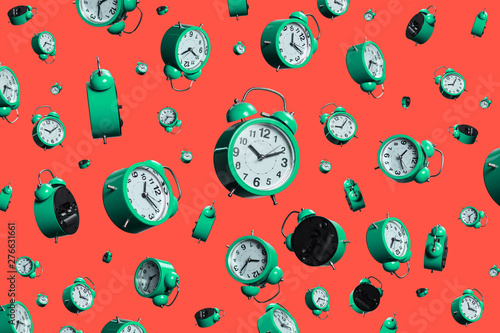 full frame shot of floating alarm clocks . time ponctuality concept . ringing clocks