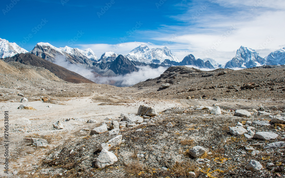 Panoramic view of Mount Everest (8,848 m) the highest mountains in the world with Himalayan range view from Renjo la pass (5,340 m) during trekking in Sagarmatha national park, Nepal. Panoramic view of Mount Everest (8,848 m) the highest mountains in the world with Himalayan range view from Renjo la pass (5,340 m) during trekking in Sagarmatha national park, Nepal.