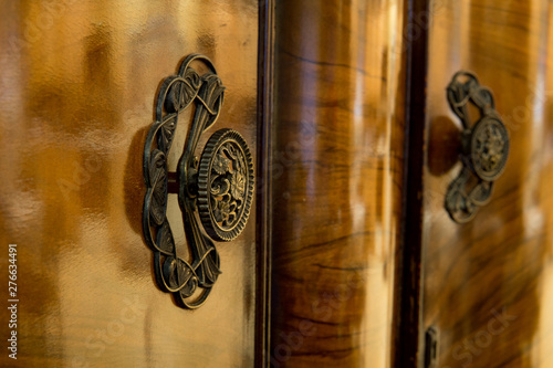 Antique closet knobs Burled Walnut Veneer Background