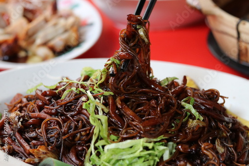 Photography Fried Hokkien Mee Noodle ,one of popular food at Petaling street in Kuala Lumpur's Chinatown, Malaysia