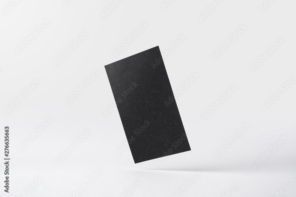 Fototapeta premium front view of black business card on white