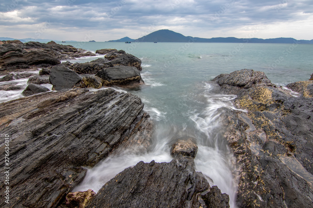 Sea dawn with waves and rocks at nha trang Sea dawn with waves and rocks at nha trang