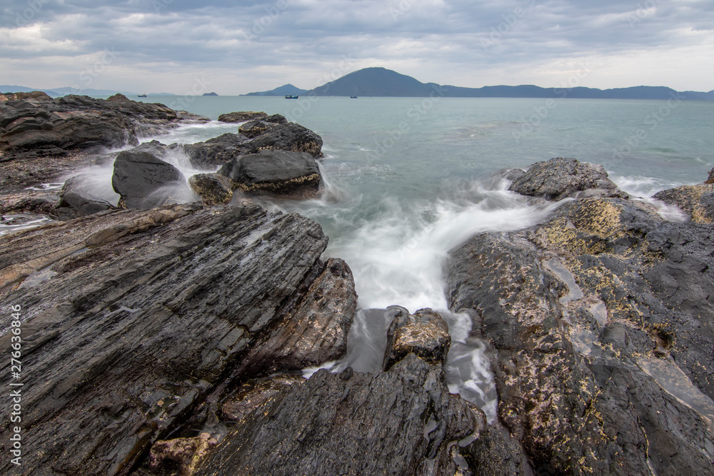 Sea dawn with waves and rocks at nha trang Sea dawn with waves and rocks at nha trang