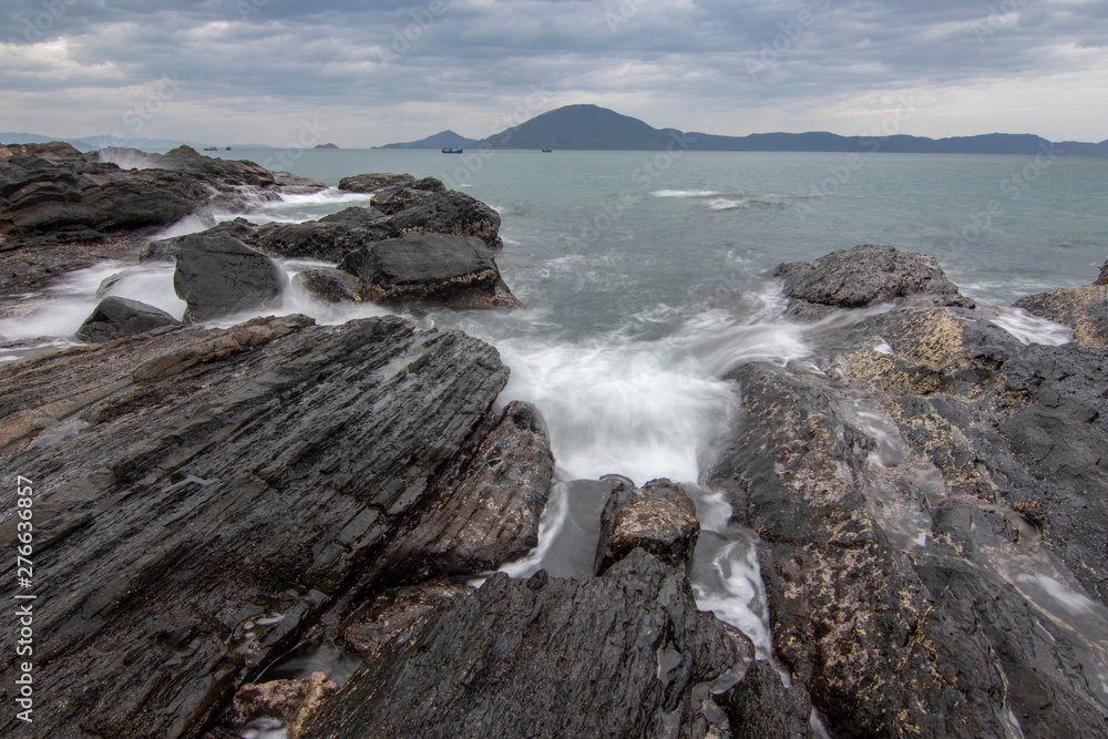 Sea dawn with waves and rocks at nha trang Sea dawn with waves and rocks at nha trang