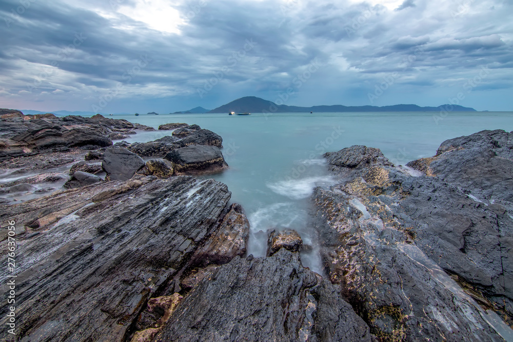 Sea dawn with waves and rocks at nha trang Sea dawn with waves and rocks at nha trang