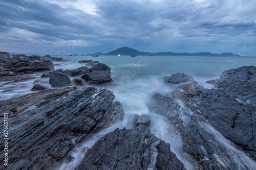 Sea dawn with waves and rocks at nha trang © Nguyen