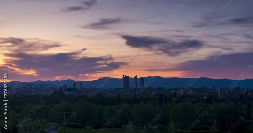 Timelapse of a beautiful sunset in Madrid. Madrid skyline, four towers bussines area as main subject. Timelapse of a beautiful sunset in Madrid. Madrid skyline, four towers bussines area as main subject.