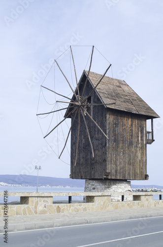 The wooden windmill is symbol of town Nessebar in Bulgaria