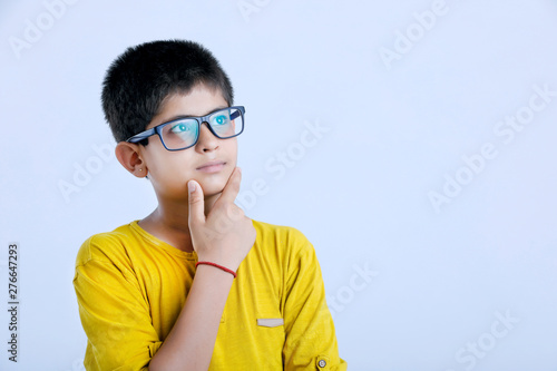 young indian cute boy thinking expressions