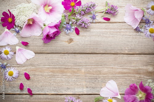 summer flowers on old wooden background