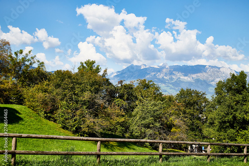 Mountains with trees and sky with clouds over them in a good summer day © keleny