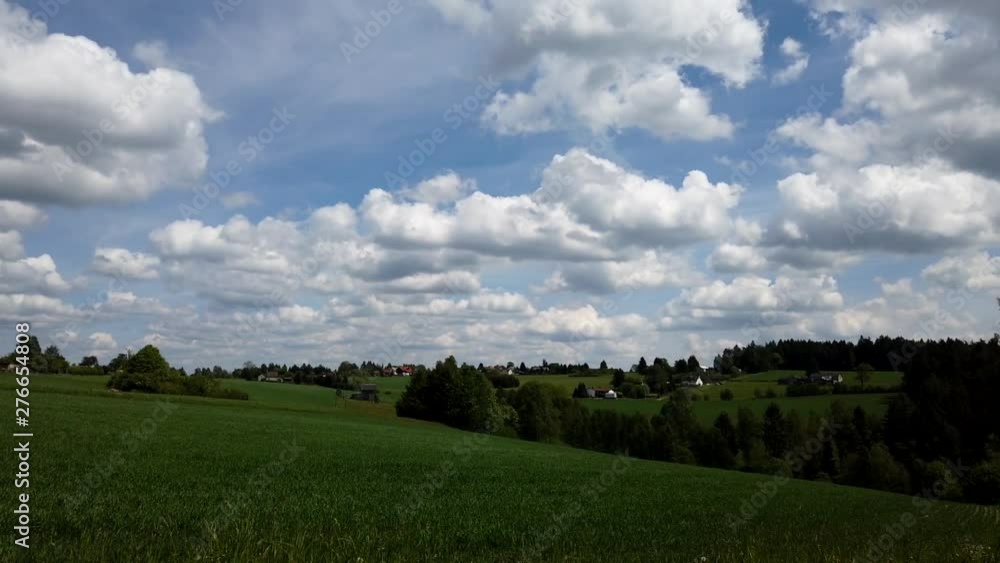 Bluesky with fast moving clouds. Motiontimelapse at the countryside in germany Bluesky with fast moving clouds. Motiontimelapse at the countryside in germany