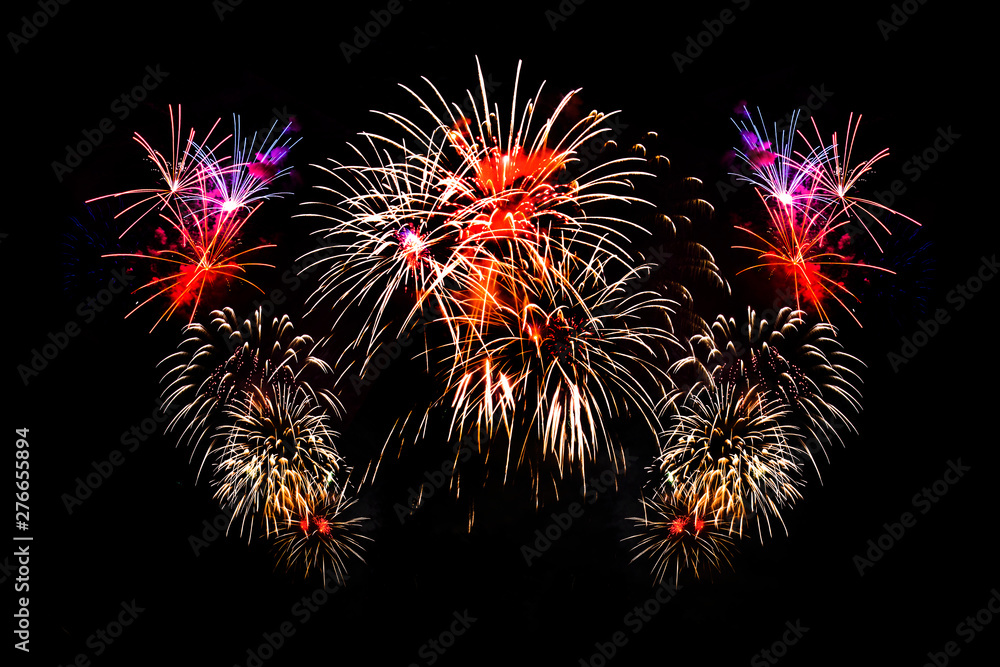 Awesome isolated Festive fireworks on a dark background. Can be used as wallpaper or background Awesome isolated Festive fireworks on a dark background. Can be used as wallpaper or background