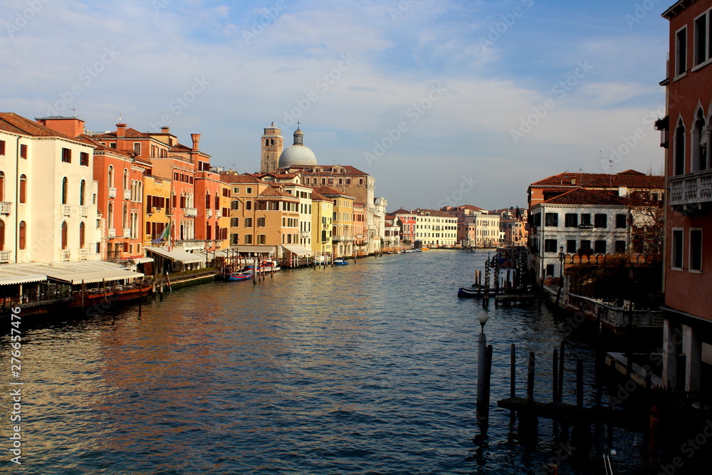 Venezia, Italia, December 28, 2018 panoramic view of a Venice canal with a dome in the background