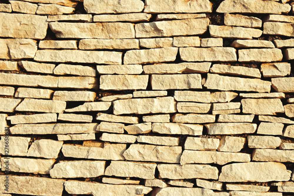 Fototapeta premium Wall of stones. Stone slabs. Can be used as a texture, background or wallpaper