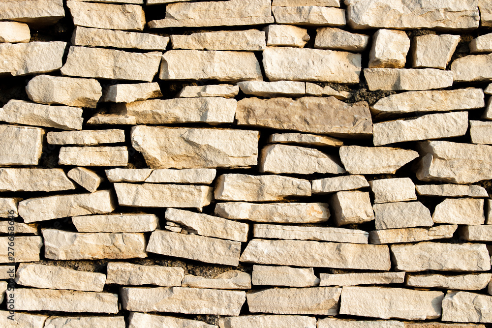 Obraz premium Wall of stones. Stone slabs. Can be used as a texture, background or wallpaper