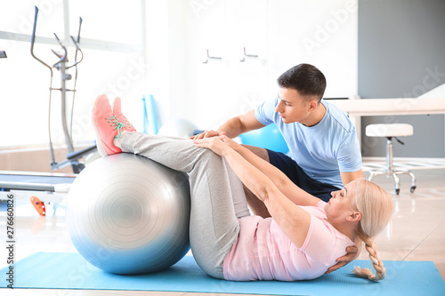 Physiotherapist working wit...