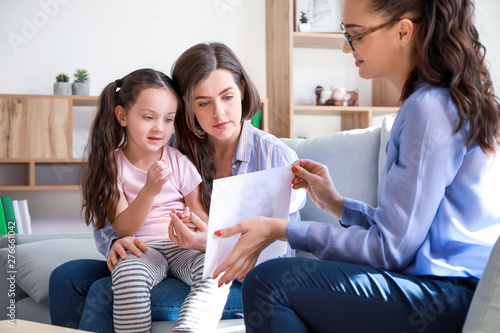 Female psychologist working...