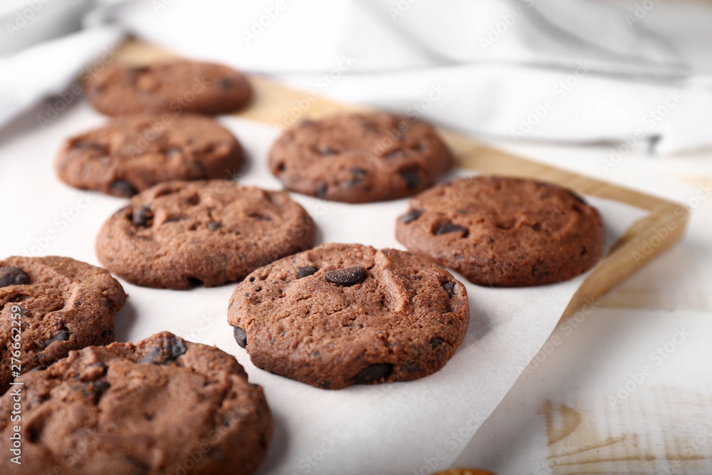 Tasty chocolate cookies on light table Tasty chocolate cookies on light table