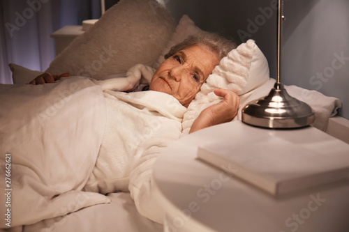 Senior woman suffering from...