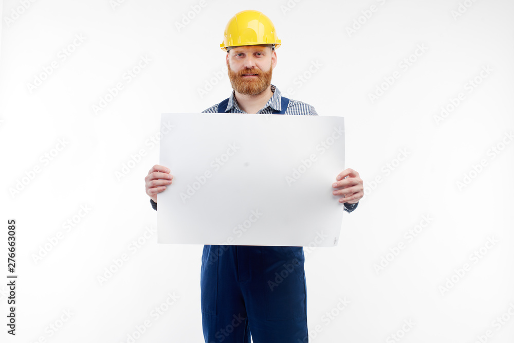 Engineer shows drawings to the camera on a white background. Engineer shows drawings to the camera on a white background.