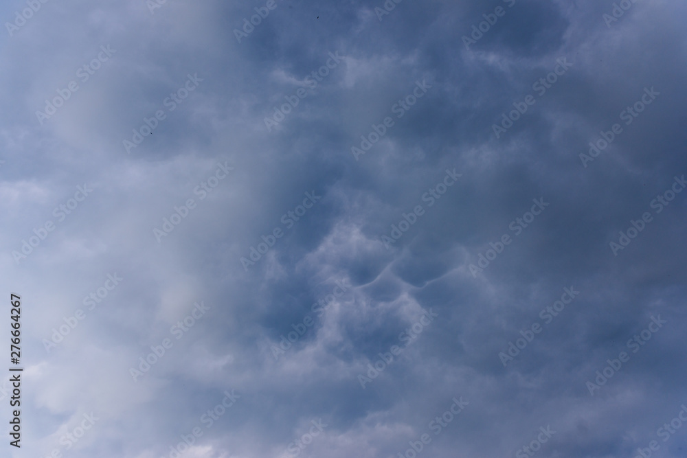 Looking up at Mammatus Clouds in the summer evening sky, background in Poltava, Ukraine