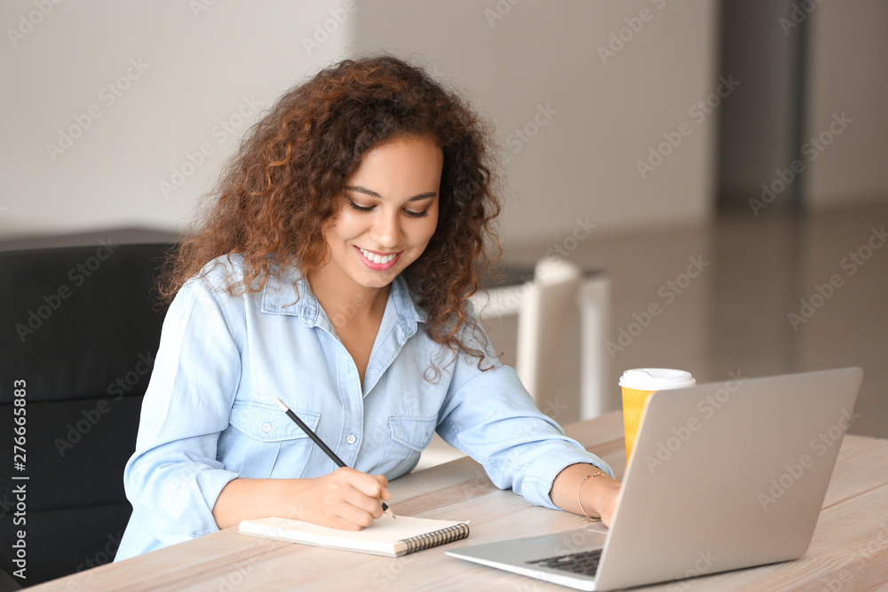 Young African-American student preparing for exam Young African-American student preparing for exam