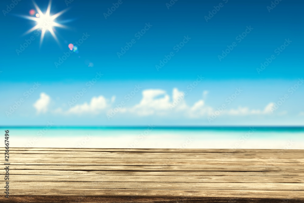 Table background of free space and summer background of beach 