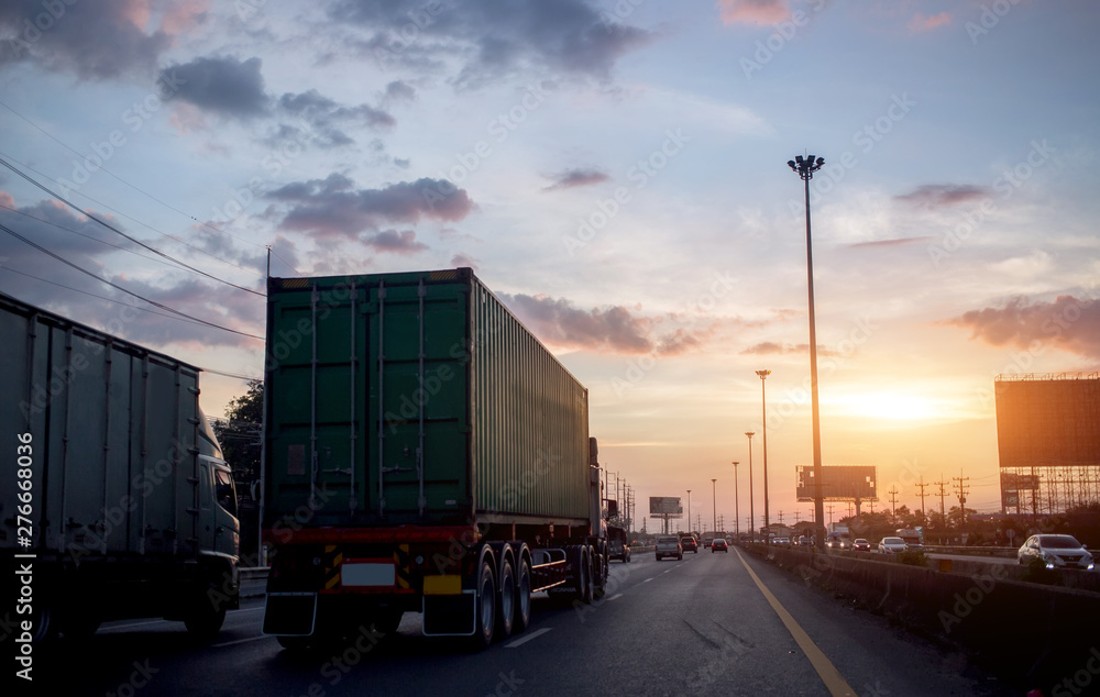 contain truck transport on road in sunset