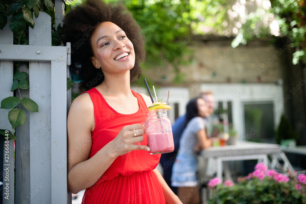 Portrait of a young black woman, model of fashion wearing dress with afro hairstyle Portrait of a young black woman, model of fashion wearing dress with afro hairstyle