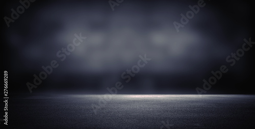 Dark room with light background.