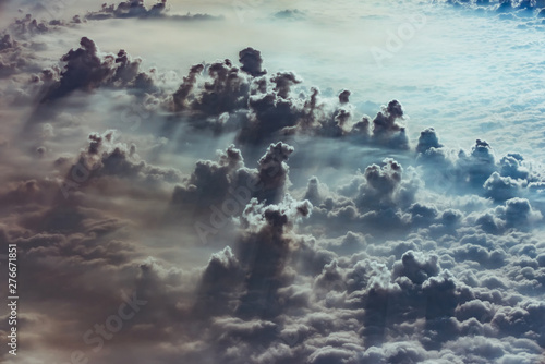 cloud and sky view from the window of an airplane