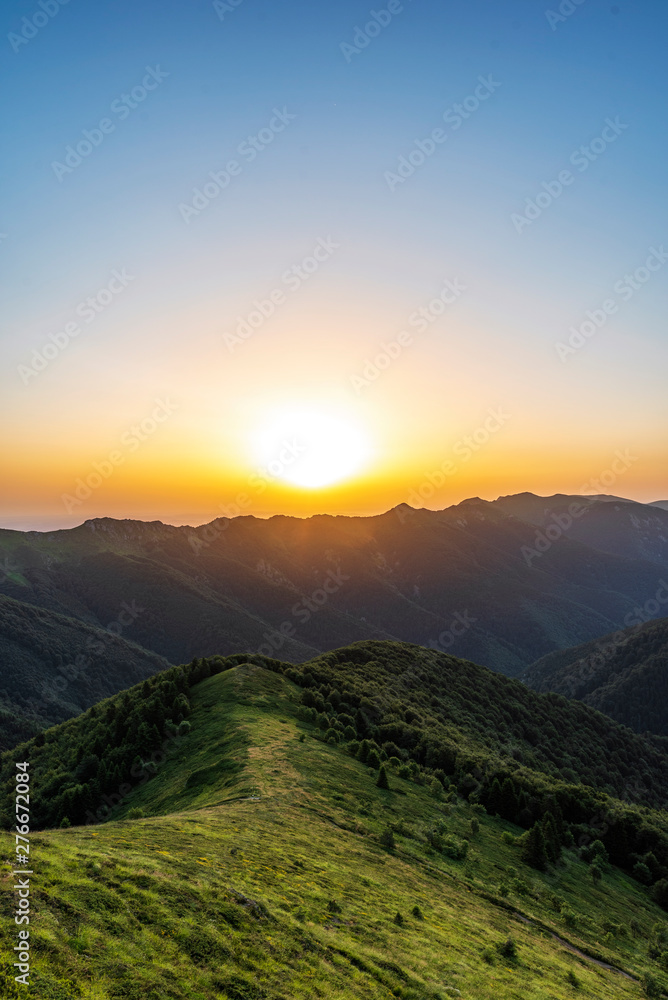Scenic view of sunrise in the mountain. Landscape with copy space for text on sky.