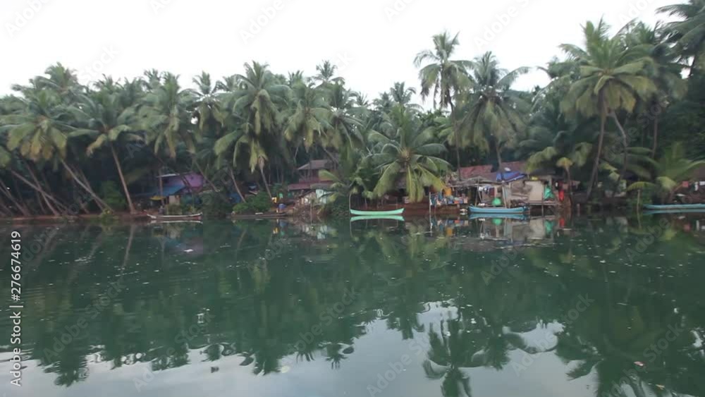 A beautiful look of the village on backwater A beautiful look of the village on backwater