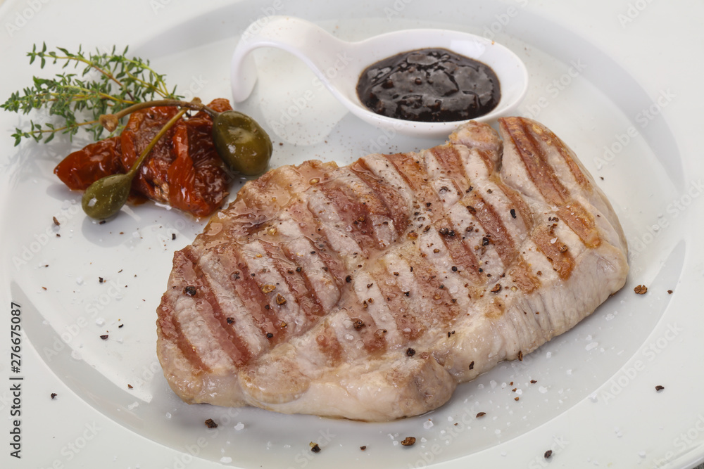 Grilled pork steak with pepper sauce Grilled pork steak with pepper sauce