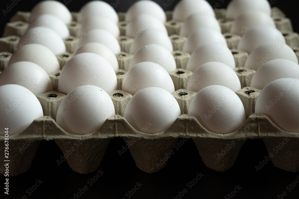 White eggs in pulp paper egg tray. White eggs in recycable pulp egg tray White eggs in pulp paper egg tray. White eggs in recycable pulp egg tray
