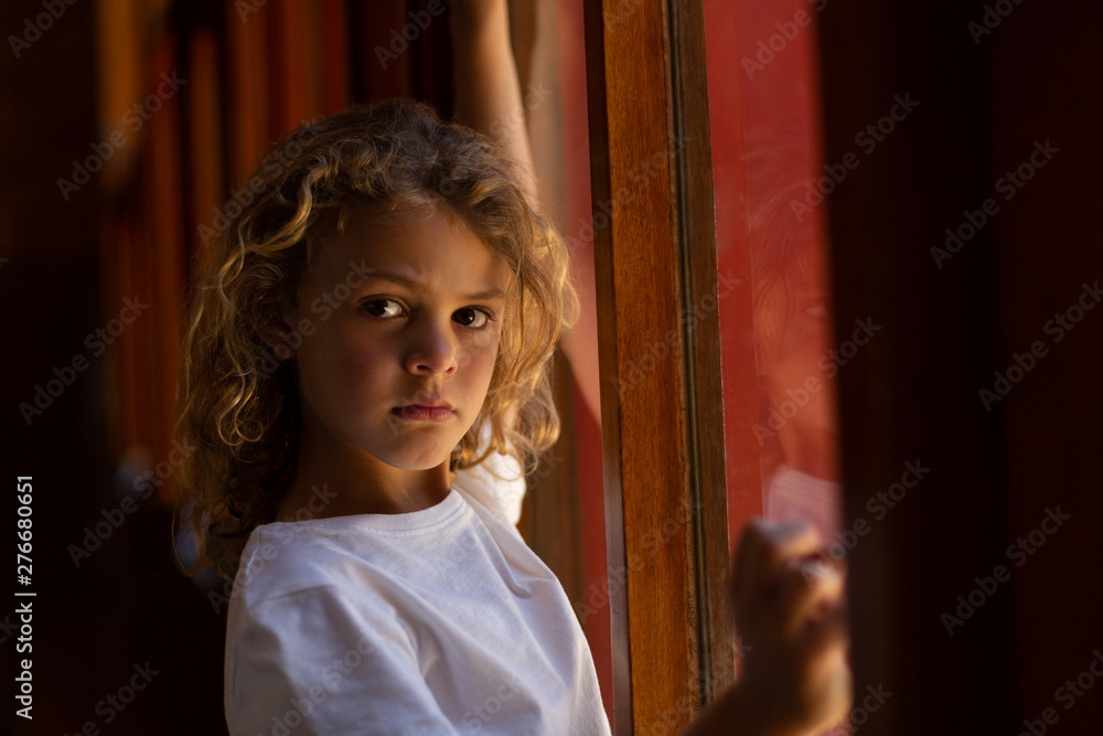 Schoolgirl looking at camera in school Schoolgirl looking at camera in school