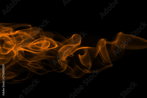 Yellow smoke abstract on dark background, fire design