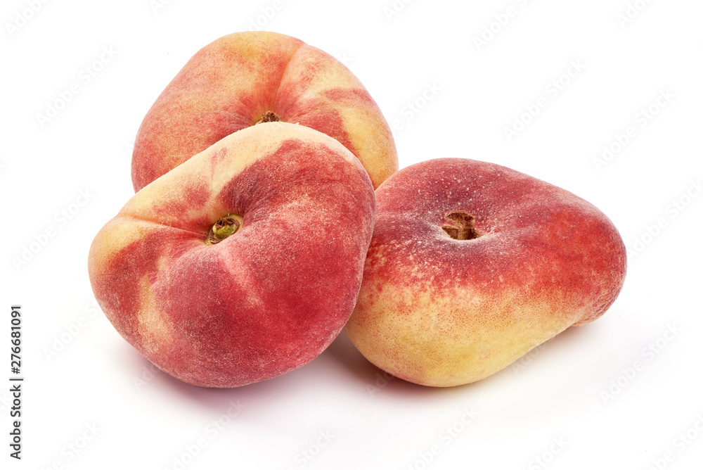 Flat Peaches, ripe nectarines, close-up, isolated on white background Flat Peaches, ripe nectarines, close-up, isolated on white background