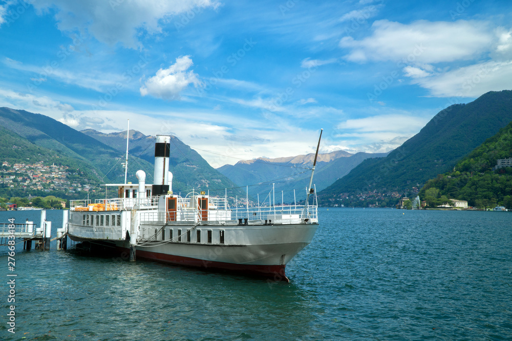 Beautiful white vintage ferry on Lake Como.