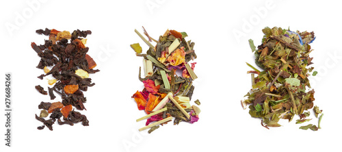 Top view of an assortment of loose tea leaves isolated on white