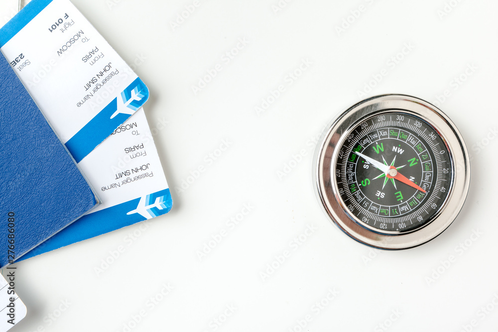 Time to Travel. Idea for tourism with flight tickets and compass on white Time to Travel. Idea for tourism with flight tickets and compass on white