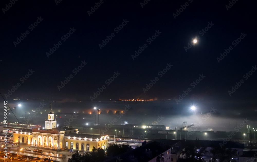 The station square of Yaroslavl. fog over the city and the railway. Night