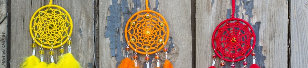 Banner of Handmade dream catcher with feathers threads and beads rope hanging